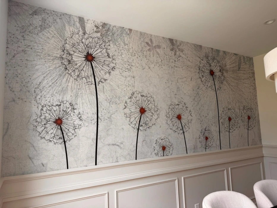 Oversized dandelion mural wallpaper above white wainscoting in a Denver dining room